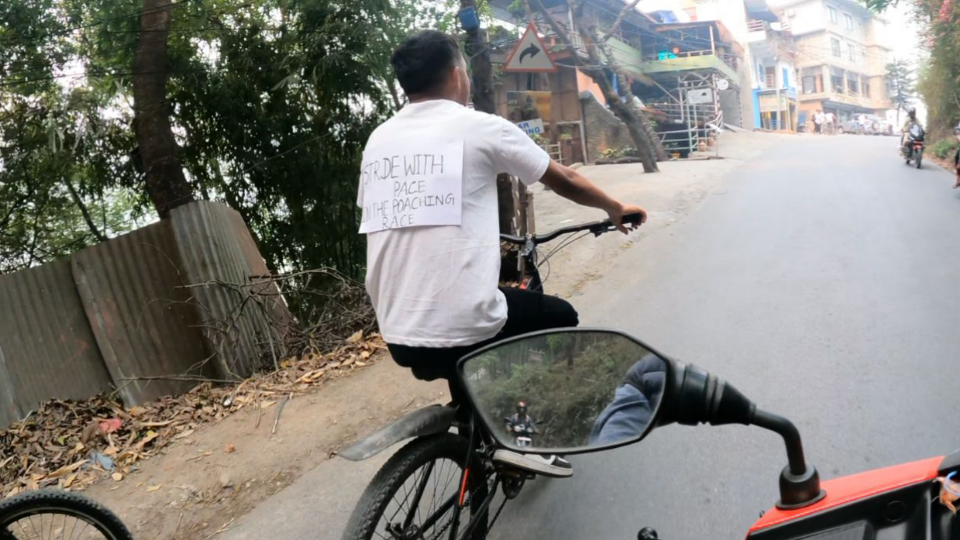 Save the Jungle and Save the Animal With Poster in Bicycle in Nepal