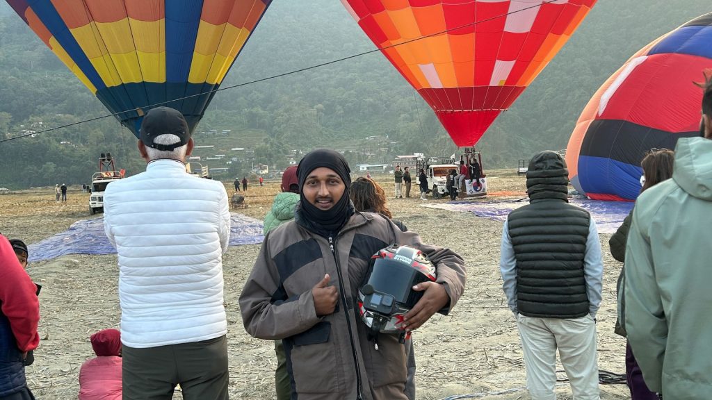 Taking A Photo With A Helmet Hot Balloon At The Internation Balloon Festival In Pokhara 2024