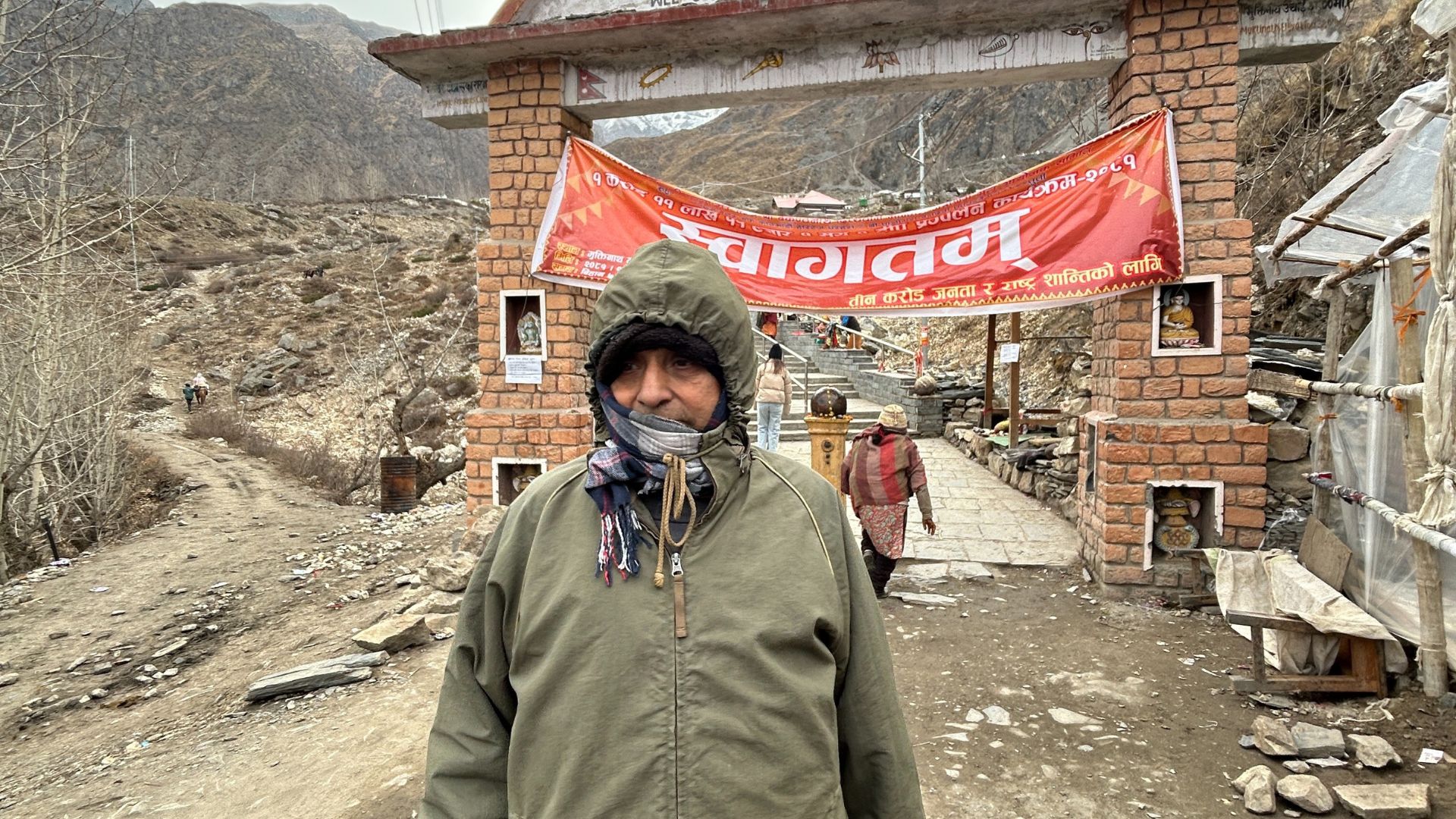 Father Standing On Main Gate Of Muktinath In 2082